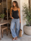 Black Dotty Peplum Top